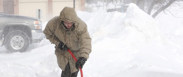 Snow Shoveling In Blizzard